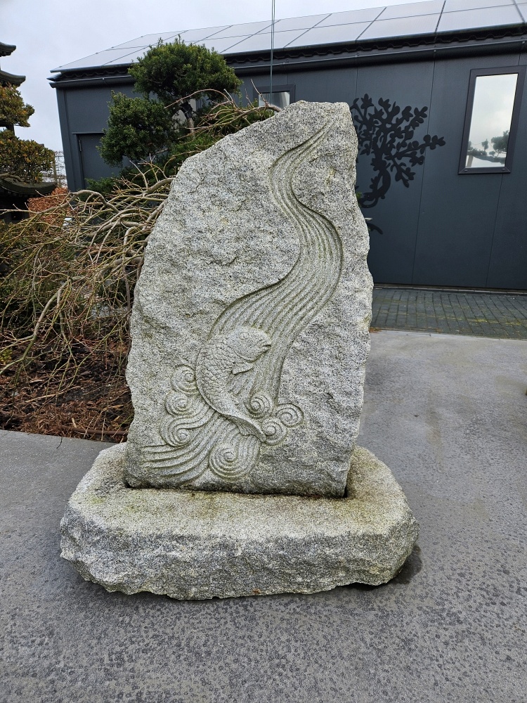 Carp in river Statue